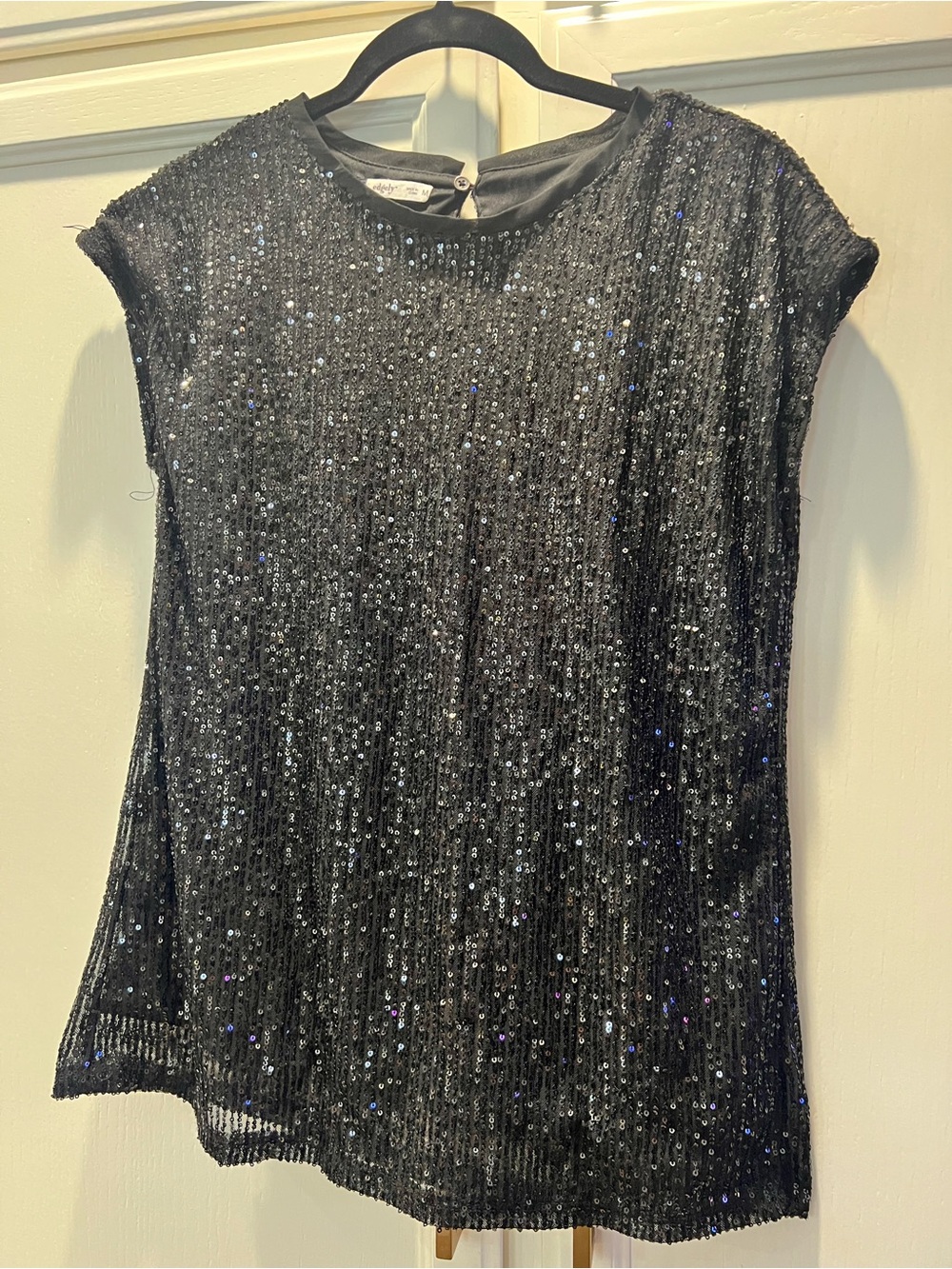 EUC Black Sequin Short Sleeve Top. Comes lined. Size M